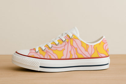 Pink feathers on yellow