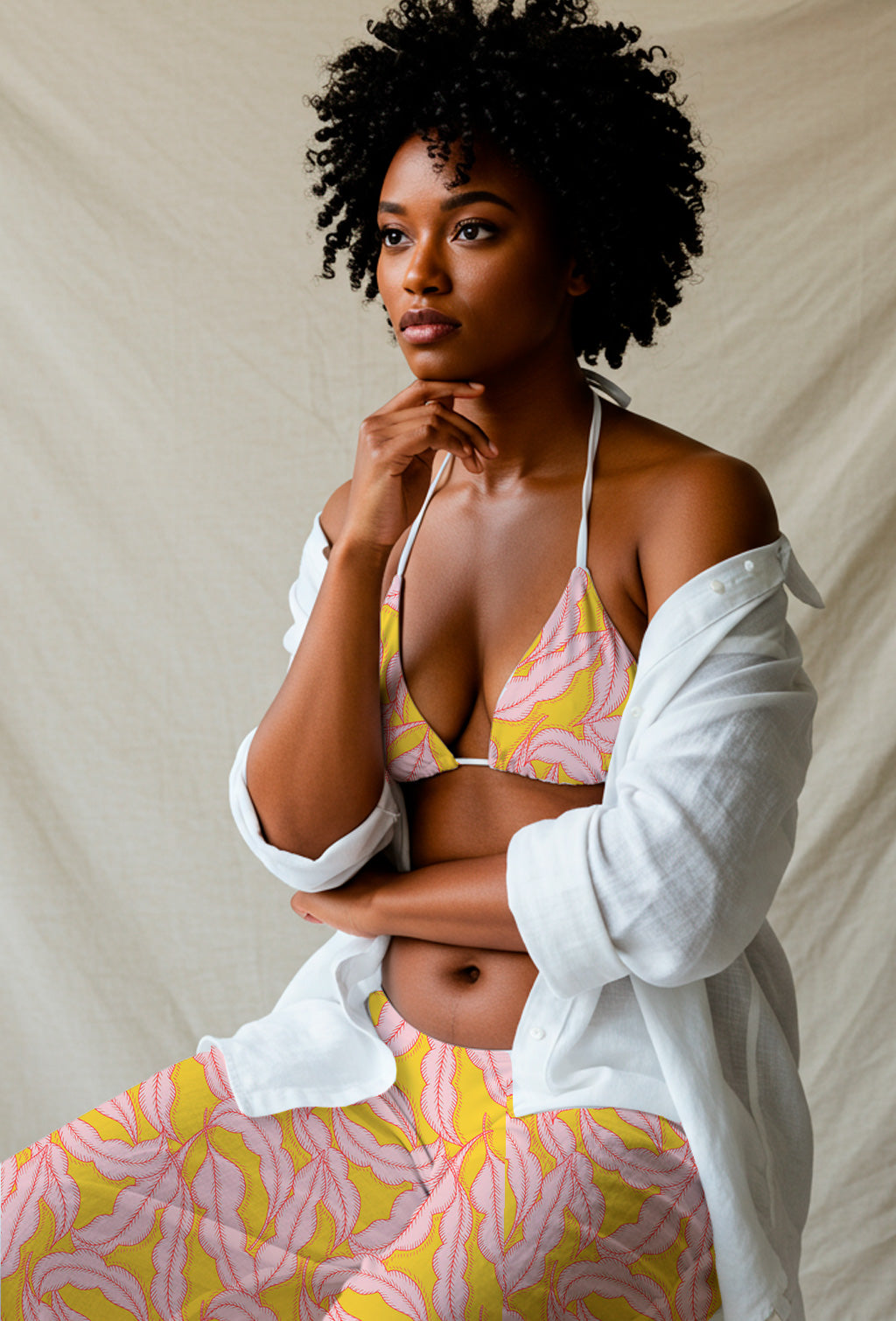 Pink feathers on yellow