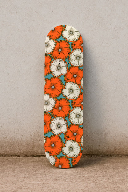 A bold floral pattern with orange and cream blossoms