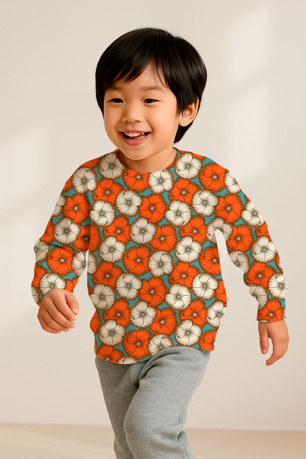 A bold floral pattern with orange and cream blossoms